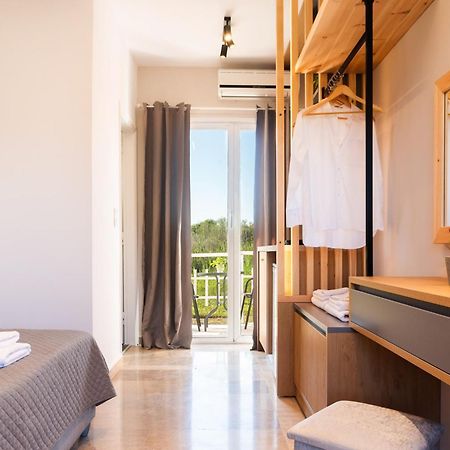 Melador Beachfront Apartments Kavos Bagian luar foto