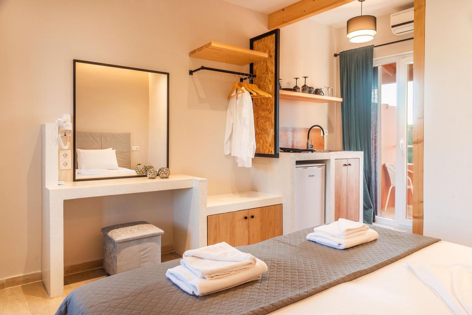 Melador Beachfront Apartments Kavos Bagian luar foto